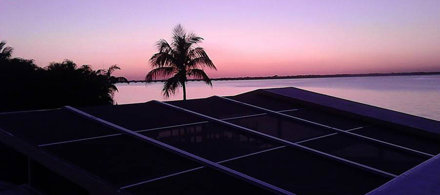 Florida Screened Pool Enclosure at sunset